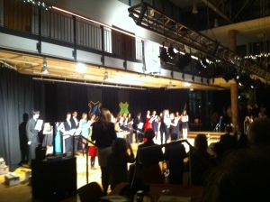 The students receiving their report cards/diplomas. Sorry for the poor quality! 